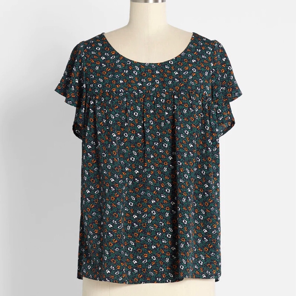 Sweetness In the Air Flutter Sleeve Top
By Molly Bracken